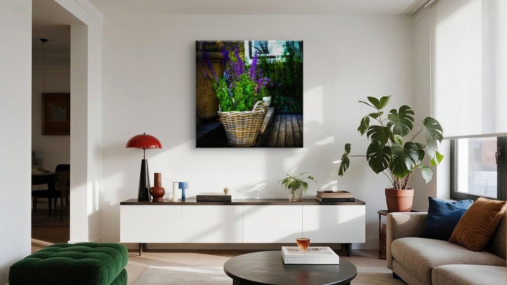 Modern living room with a painting of flowers on the wall, a lamp, and a sofa.