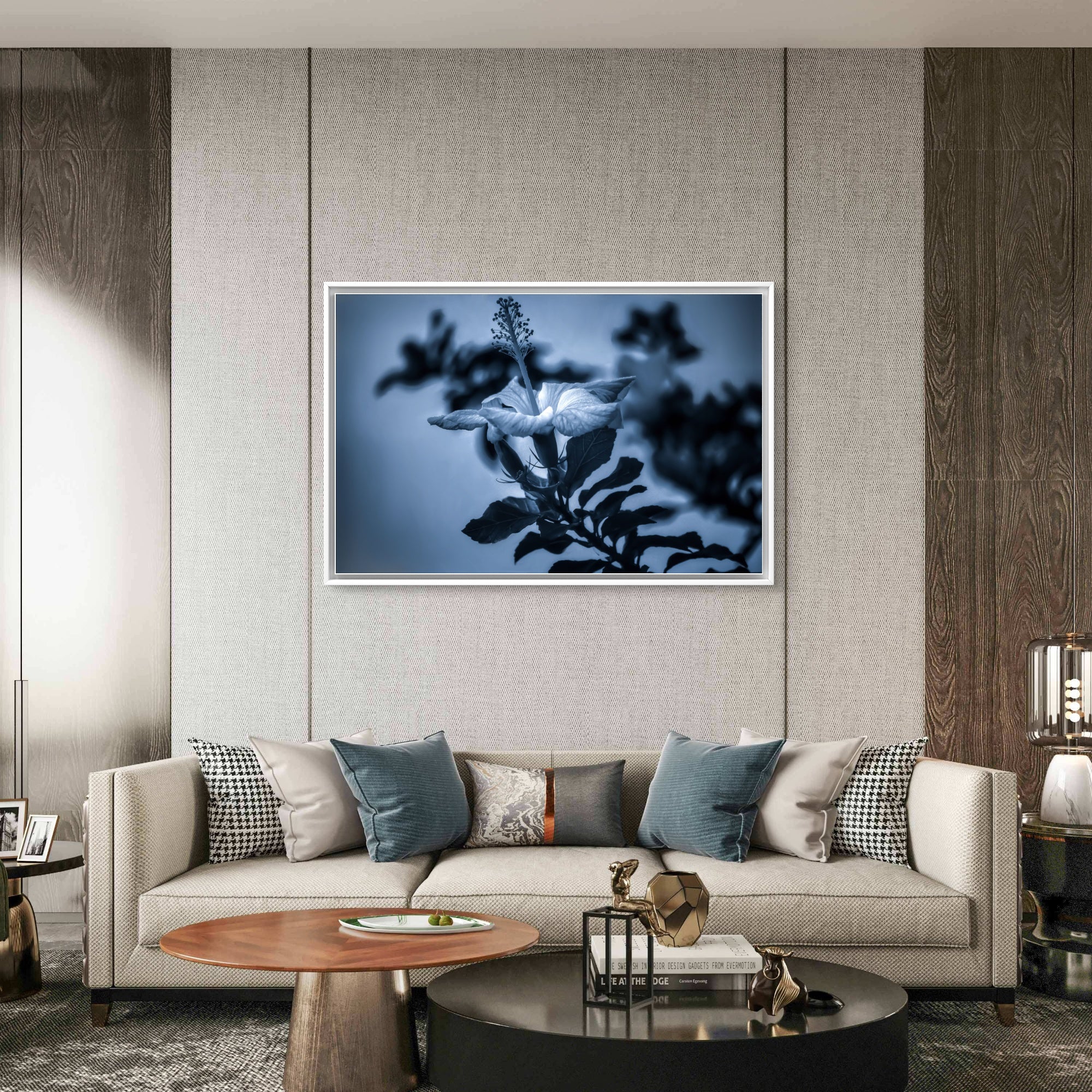 Modern living room with a floral artwork on the wall above a sofa.